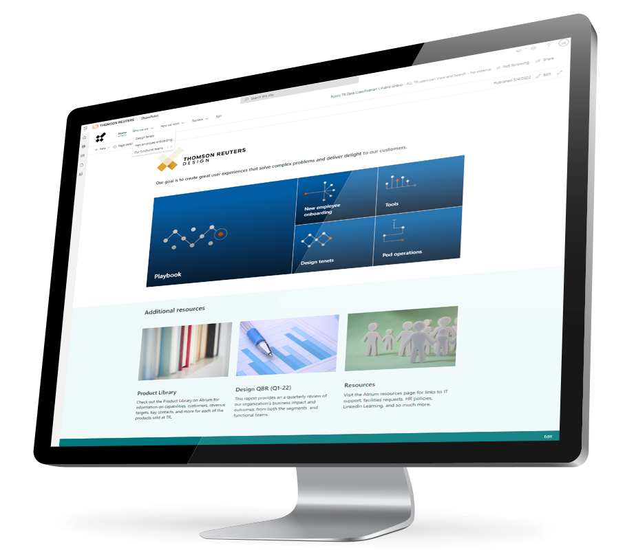 A monitor showing the Thomson Reuters website