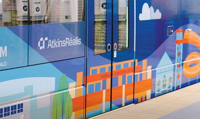 Colorful illustrations on the side of a building